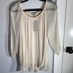 Sheer silk blouse in champagne lined with cozy knit.